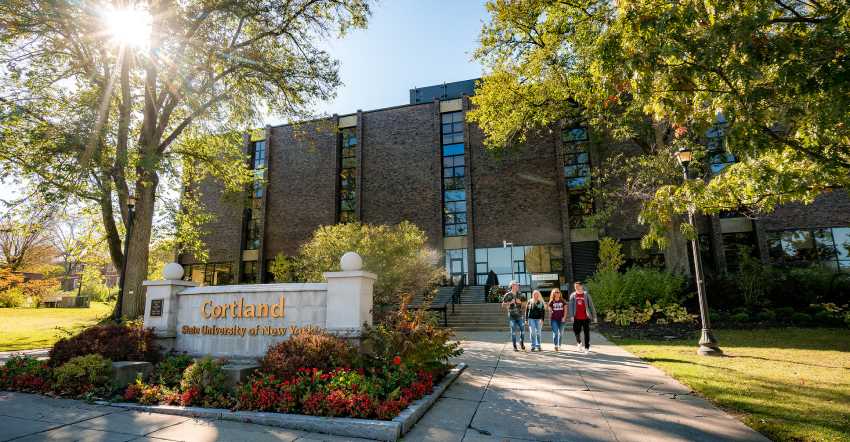 students walking outside of Miller Building